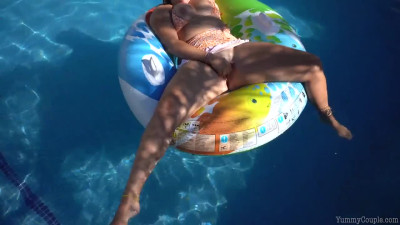 Fun in the pool with busty blonde wife
